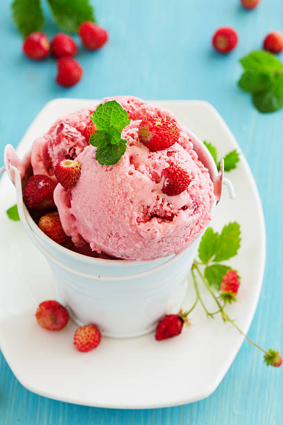 istock Homemade ice cream with wild strawberry. 476972384
