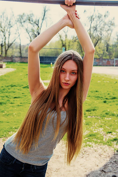 istock Girl with her hair 476974924