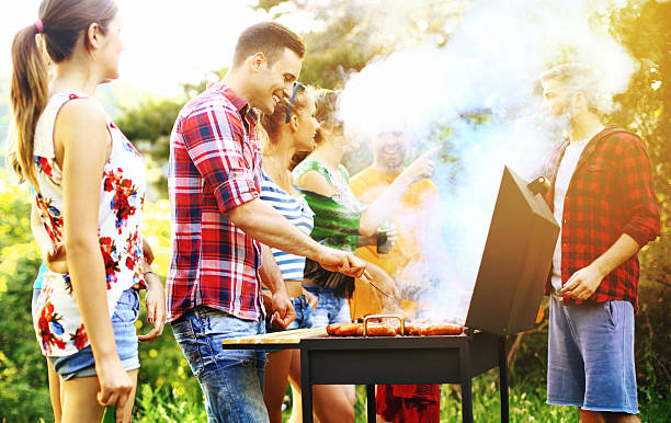 istock Friends having barbecue party. 476975472