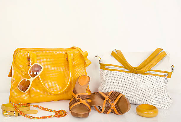 istock Cute summer yellow purses with matching sandals and accessories. 476975680