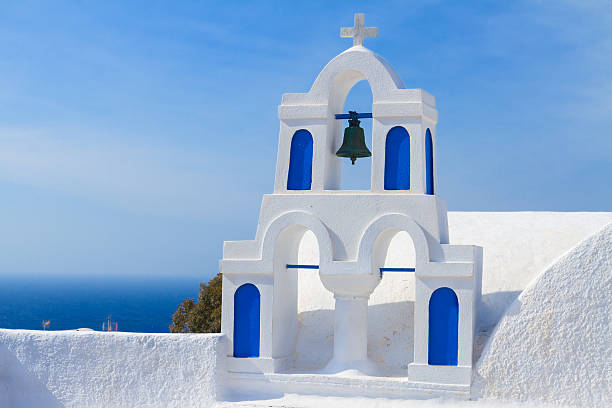 istock white with blue belfry, Santorini island, Greece 476975866