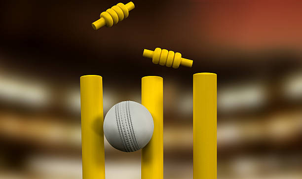 istock Cricket Ball Hitting Wickets Night 476977129