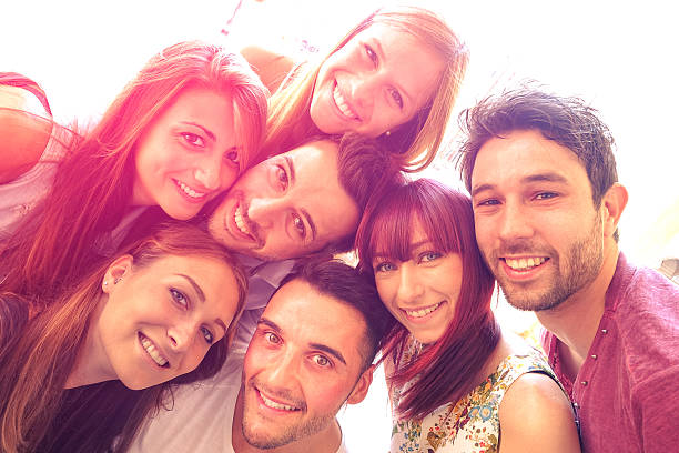 istock Best friends taking selfie outdoors with backlight contrast halo 476977392