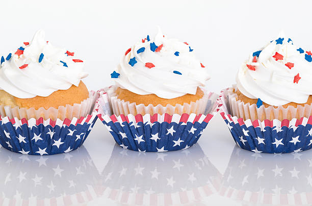 istock Row of patriotic cupcakes with sprinkles 476977630