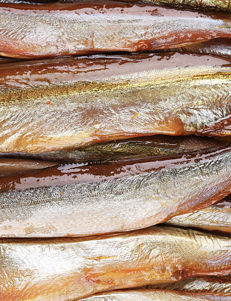 istock Smoke-dried fish close up. 476980641