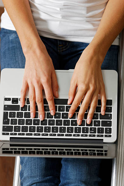istock Woman typing on laptop 476981515