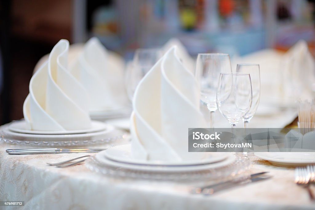 Table set for reception Table set for an event party or wedding reception Dinner Stock Photo