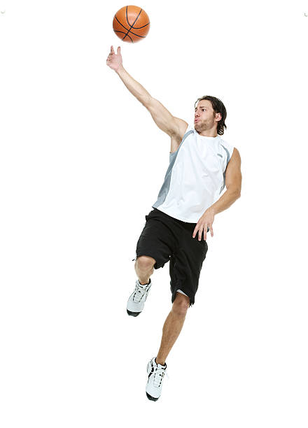 istock Sports man playing with basketball 476982082