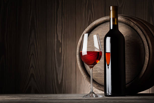 istock Red wine in glass with bottle 476982412