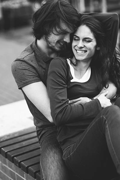 istock Happy young couple flirting in the park 476982498