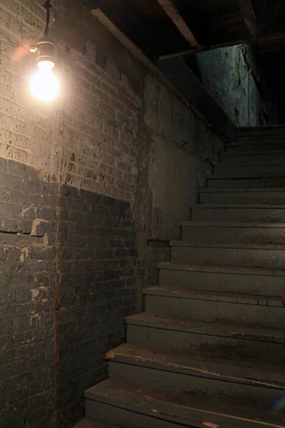 istock Hanging Light in Stairwell 476982753