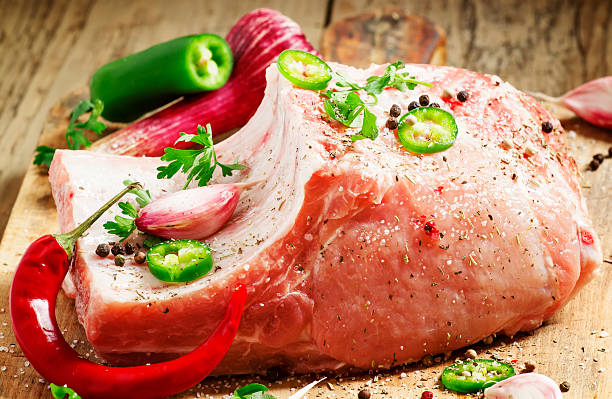 istock Fresh whole pork loin with spices, selective focus 476983444