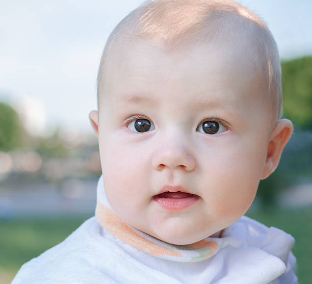 istock Baby on nature background 476983702