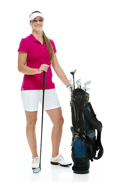 istock Smiling female golfer holding golf bag 476986620