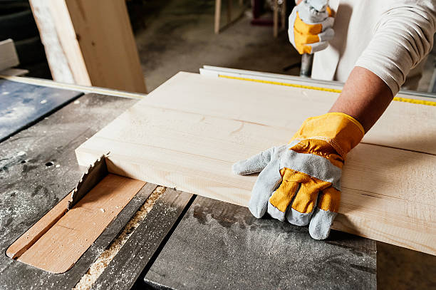 istock Close up of carpenter working on machine 476987392