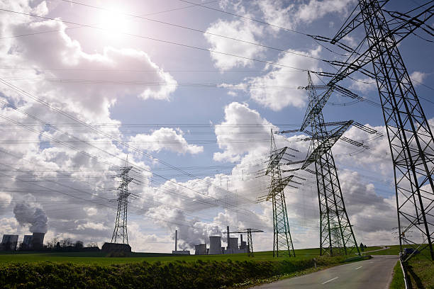 istock Electricity pylons and two power plants 476988210