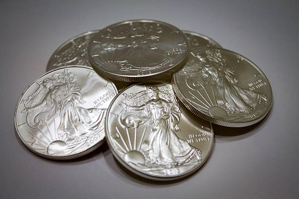 istock Pile of Silver Coins 476992284
