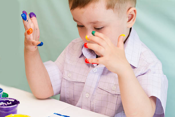 istock Children's palms, finger paints 476994816