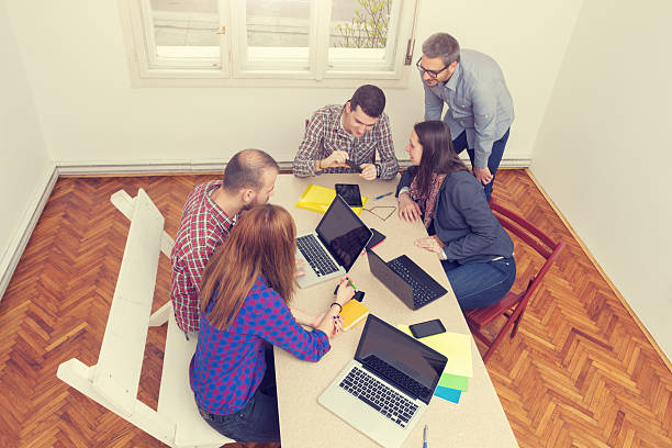 istock Young group of people discussing business plans 476995642