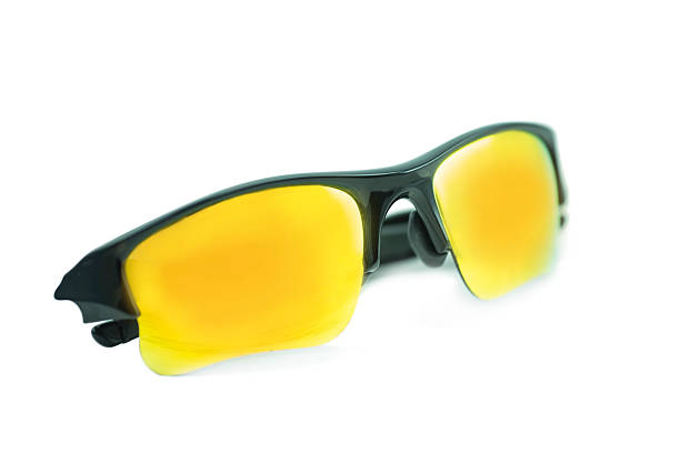 istock Orange sun glasses isolated on white. 476995818
