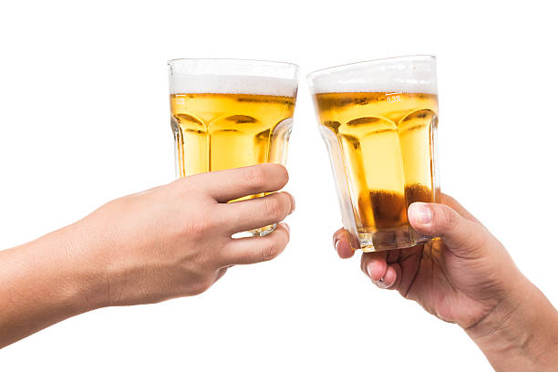 duas mãos de tostar refrescante cerveja frio - toast glass cut out human hand imagens e fotografias de stock