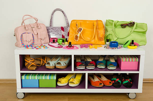 istock Lots of colorful summer accessories on a shelf. 477004534