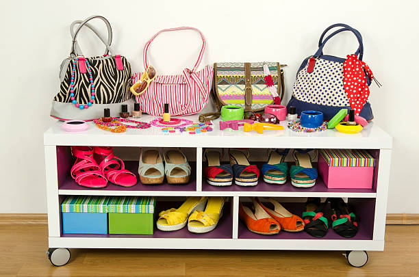 istock Lots of colorful summer accessories on a shelf. 477004556