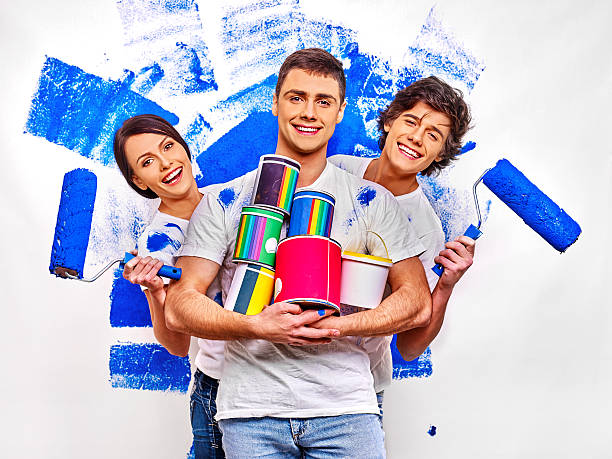 Family paint wall at home stock photo