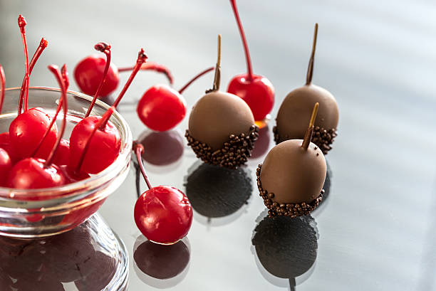 istock Chocolate and cocktail cherries on the glass 477008824