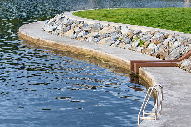 istock Silver Pool ladder near Lake 477008864