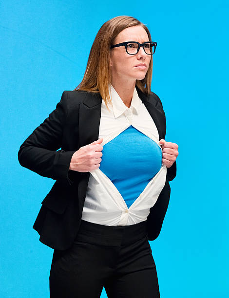 istock Businesswoman acting like superhero 477009520