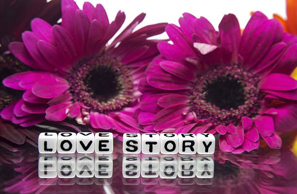istock Pink flowers with love story small text 477009953
