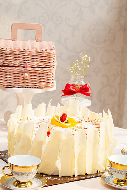 istock Delicious white Birthday Cake with props 477010576