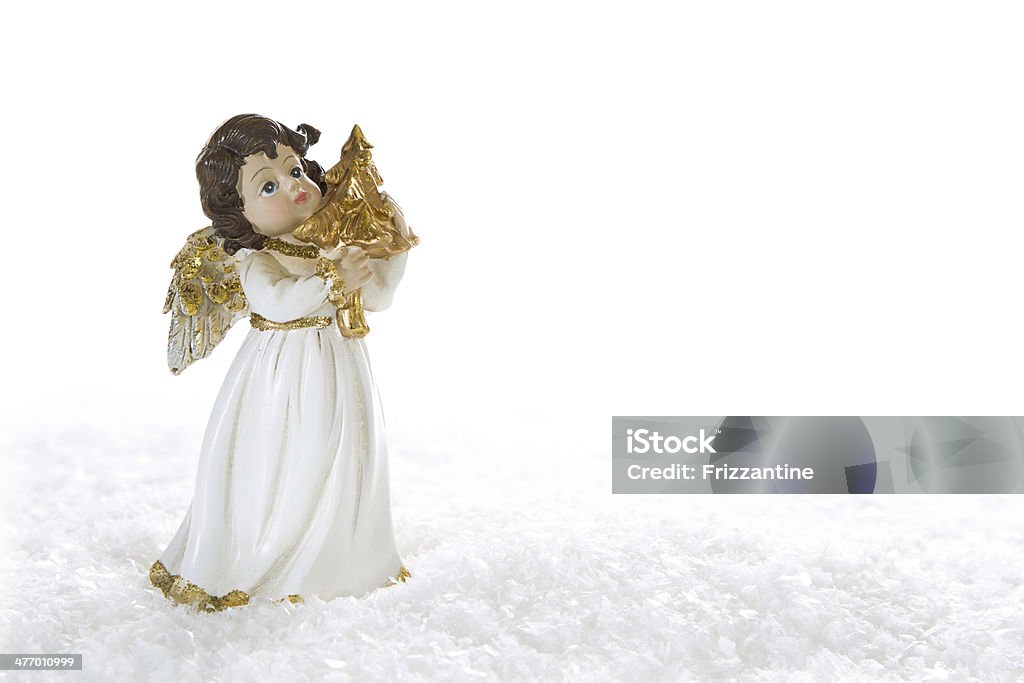 Christmas angel - isolated for white snowy background. White golden christmas angel for decoration - isolated on white background with snow for a greeting card Angel Stock Photo