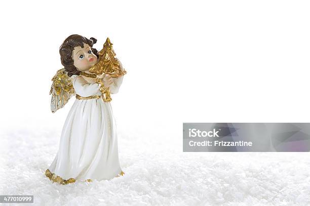 Christmas Angel Isolated For White Snowy Background Stock Photo - Download Image Now