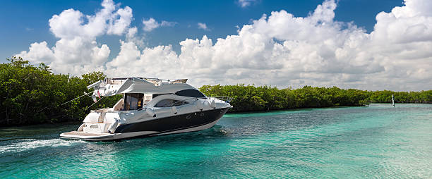 istock Luxury  motor yacht sailing out at sea 477014710