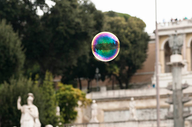 istock soap bubble in the center of Rome. 477016008