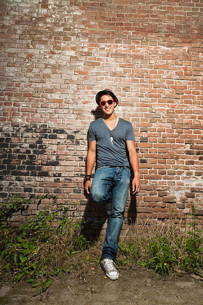 istock Urban asian man with red sunglasses. Good looking. Cool guy. 477017359