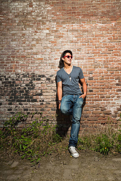istock Urban asian man with red sunglasses. Good looking. Cool guy. 477017581