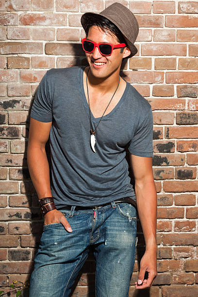 istock Urban asian man with red sunglasses. Good looking. Cool guy. 477019135