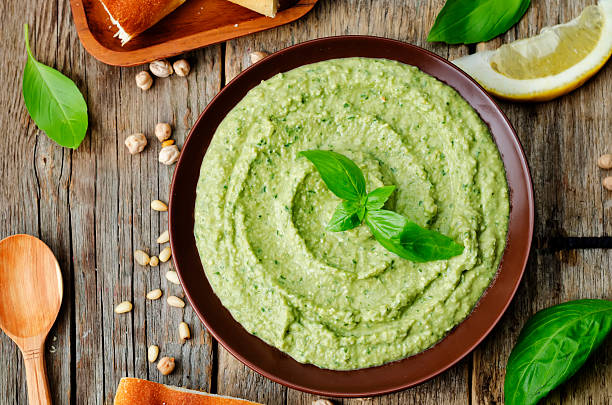 Basil pesto hummus stock photo