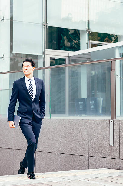 istock Asian businessman holding tablet pc 477020826