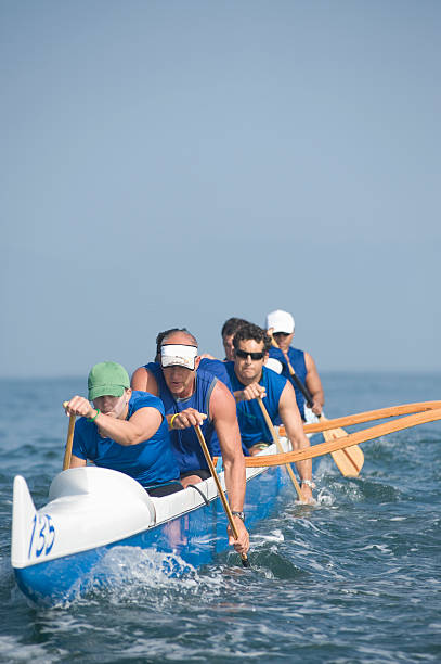 istock Outrigger Canoeing Team In Race 477022573