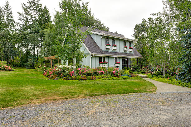 istock Cozy farm house with beautiful flowerbed 477026579