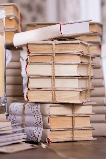 istock Old books heap in vintage library 477028292