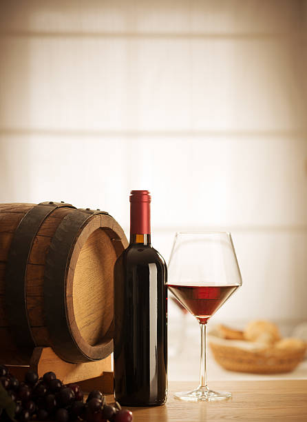 istock Wine glass and bottle still life 477031097