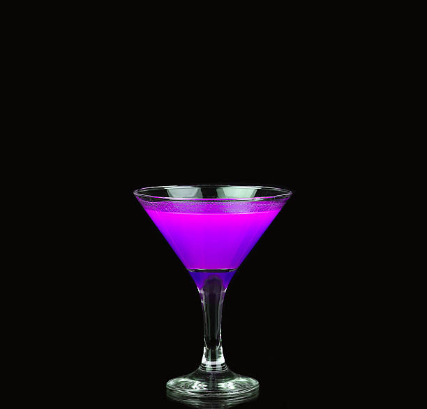istock refreshing purple martini served  on a black background garnished 477031860