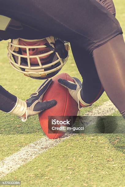 American Football Player Stock Photo - Download Image Now - 2015, Adult, American Football - Ball