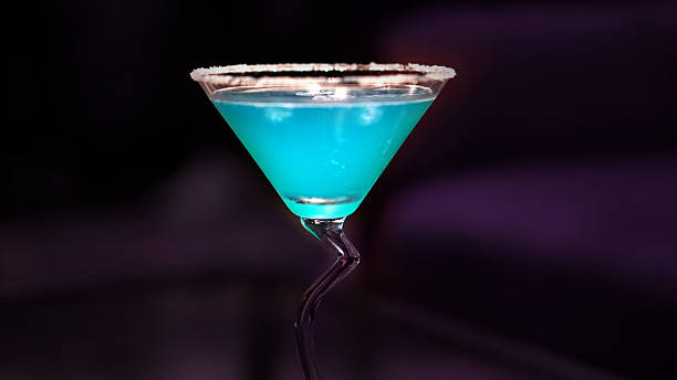 istock blue cocktail on dark isolated background 477033670