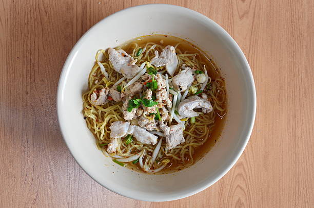 istock egg noodle topping with boiled pork in soup 477036396